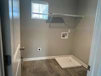 Landry Room  *COLORS AND SELECTIONS VARY, HOME PICTURED IS AN EXAMPLE OF THE FLOORPLAN NOT THE ACTUAL HOME*