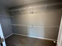Primary Closet   *COLORS AND SELECTIONS VARY, HOME PICTURED IS AN EXAMPLE OF THE FLOORPLAN NOT THE ACTUAL HOME*