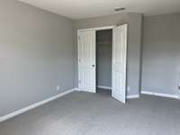 Secondary Bedroom  *COLORS AND SELECTIONS VARY, HOME PICTURED IS AN EXAMPLE OF THE FLOORPLAN NOT THE ACTUAL HOME*