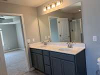 Primary Bath   *COLORS AND SELECTIONS VARY, HOME PICTURED IS AN EXAMPLE OF THE FLOORPLAN NOT THE ACTUAL HOME*