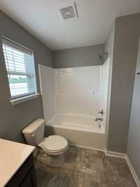 bathroom # 2 upstairs tub (the window gives the bathroom so much natural lightning)