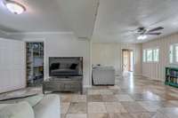 Gathering room with view into laundry room