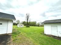 small outbuilding and permission tree