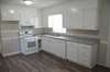 Updated kitchen with granite counter-top.