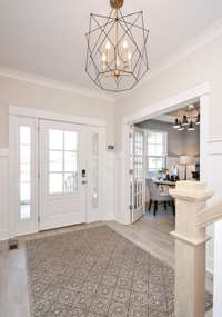 Welcome guests to your new home in this beautiful foyer! Photo not of actual home.