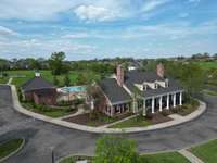 Kennesaw Farms Clubhouse has 2 pools, and a playground in back