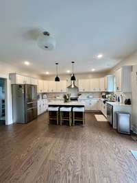 bigger view of Kitchen showing the Breakfast Room space