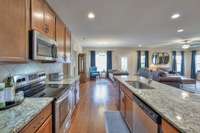 Stainless steel appliances in kitchen all convey with home