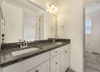 Raised Vanity in Jack & Jill Bath with Square Bowl and Granite Top