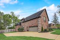 Side entry garage with extended driveway