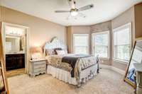 Bedroom #2 downstairs with bay window and walk-in closet! Shared bath with bedroom #3