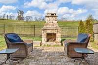 Custom Stone  Fireplace and extended patio.