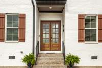 Gorgeous Front door with Beveled Glass provides an abundance of natural light!