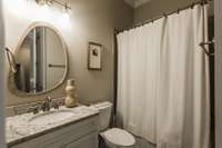 Private Bath adjacent to Bedroom #2. Tub/Shower Combination.