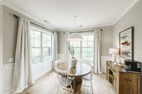 The Dining Room is surrounded by windows for natural light and is adjacent to the Patio..