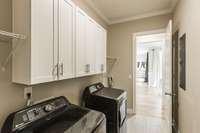 Spacious Laundry Room 12x6 ~ Tile Floor and Built in Cabinets and extra shelving.