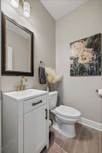 This half bath is located upstairs upstairs next to the theater room.