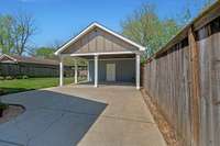 2 car detached carport with a large shed attached.  All of this inside the electronically gated privacy fence.