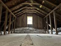 Attic room, unfinished.