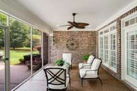 Another view of this pristine screened patio.