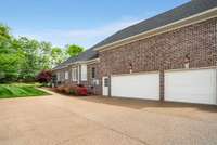 Three car side entry garage and plenty of additional parking areas for vehicles.