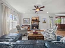 Grand living room with wood burning fireplace