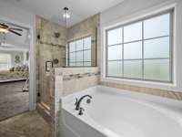 Oversized garden tub and luxury tiled shower