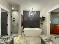Large soaker tub and walk in shower with seating