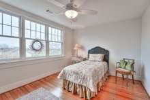 Although it is staged with a twin bed, this room easily accommodates a queen bed