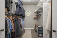 One of the walk-in closets in the primary bedroom.