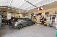 3 car garage with electric car charging station