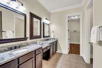 Double sinks with built-in vanity in the primary ensuite