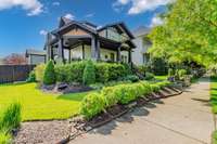 Beautiful landscaping on private corner lot.