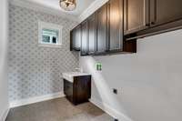 Oversized laundry room with lots of storage