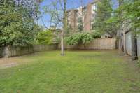 The backyard is perfect for a garage/overhead guest suite addition.