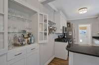 Built-in Bar with storage below in the breakfast/kitchen area.