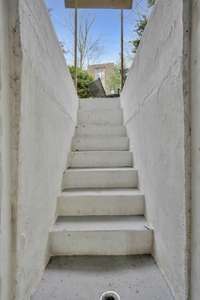 Stairwell from the basement to the backyard.