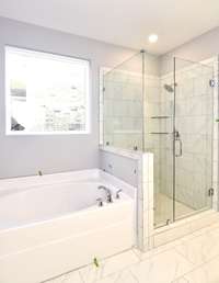 Separate soaking tub and shower in the Owner's Suite *Picture not of actual home