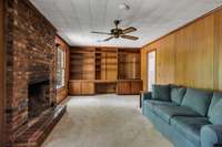 The built in bookcases in the den have a mid century modern aesthetic appeal.