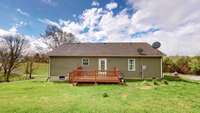 You back deck is ready for the grill and conveniently located just off the kitchen/dining area.