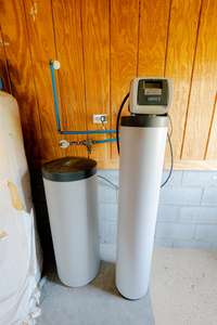 The house includes a whole-house water softening system, ensuring optimal water quality throughout.