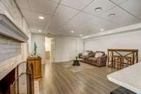 Lower level living area with fireplace.