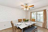 Dining room also has great light as it looks into the Florida/Sun room