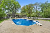 Serene pool area facing the house. Perfect for unwinding and enjoying the view.