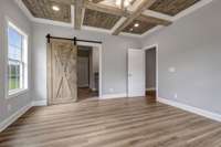 Barn door entry to the master bath