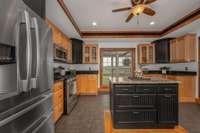 Stainless appliances, gas stove and tons of cabinet and countertop space.