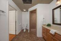 The ensuite bath attached to bedroom # 2. The walk-in closet is off of this space.