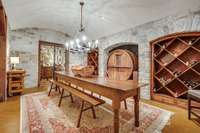 Entertain in style in this grand entertainment space- Wine Tasting room located in the basement area. Gorgeous primitive table.