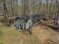 Chicken coop condo that is heated and cooled/fenced with water.