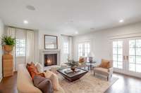 Family Room w/ double french doors opening to the covered porch